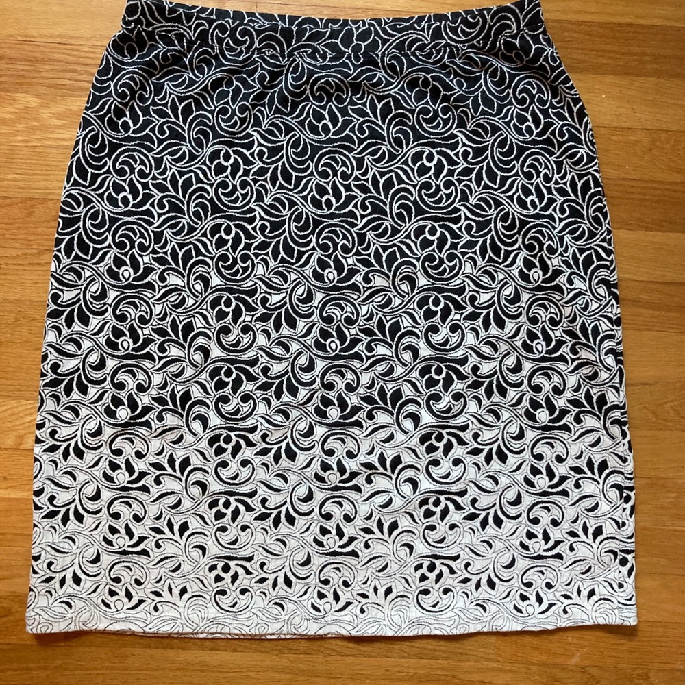 Unique black to white patterned skirt.